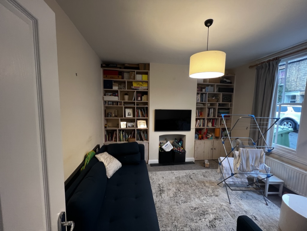 Front reception room of an Oxfordshire terraced house before conversion into a licensed HMO by RedFox Homes
