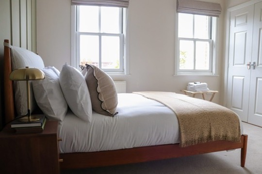 Finished bedroom after the The Marsh short-let refurbishment by RedFox Homes in Oxfordshire