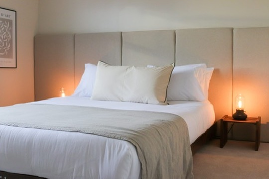 Finished master bedroom dressed for guests in an Oxfordshire short-let property